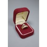 An 18ct gold five-stone diamond ring and an 18ct gold and diamond illusion-set solitaire ring,