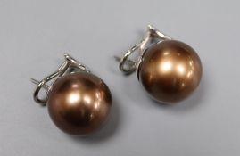 A large modern pair of white metal mounted brown freshwater pearl? earrings, diameter 16.6mm,