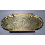 A 19th century Middle-Eastern engraved brass tray, 53cm wide