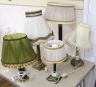 Three Corinthian column table lamps and two others