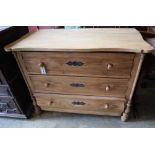 A late 19th century Continental stripped pine chest of three drawers, width 106cm depth 53cm