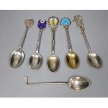 Six assorted golfing related silver teaspoons including three with enamel, gross 87 grams.