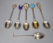 Six assorted golfing related silver teaspoons including three with enamel, gross 87 grams.