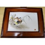 A 20th century Chinese porcelain plaque painted with birds, flowers and bamboo bearing partial