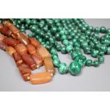 Nine assorted single strand malachite bead necklaces, one with gilt metal spacers and two agate