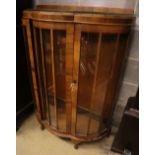 A walnut bowfront display cabinet, width 92cm depth 40cm height 124cm