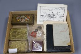 Two WWI soldier's notebooks with caricatures, three tins, King's Badge, BEM brooch, Croix de Guerre