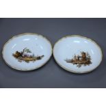 A pair of Meissen dishes with figurative landscape scenes, diameter 20cm