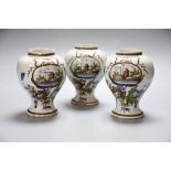 A set of three 19th century Dutch delft baluster jars, painted in colours, 14cmCONDITION: One jar