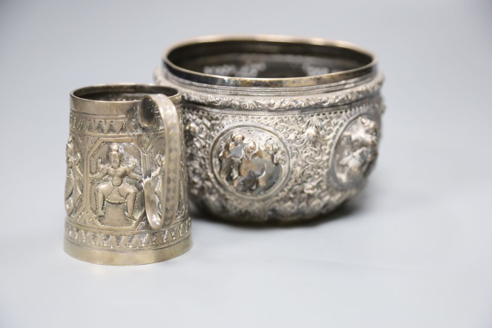 A 19th century Indian white metal embossed sugar bowl, a christening mug and a small brass bowl. ( - Image 3 of 4