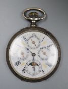 A white metal calendar moonphase keyless pocket watch.CONDITION: Scratches to the case back. Dial