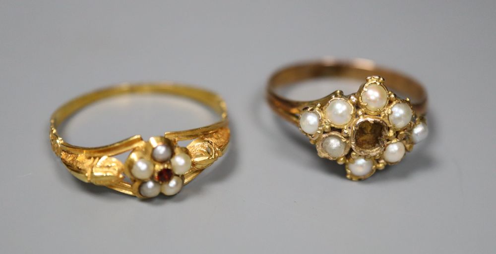 Two late Victorian yellow metal rings- garnet and seed pearl cluster and seed pearl cluster(stone