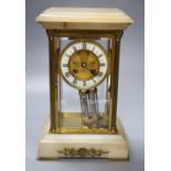 An early 20th century French brass and onyx four glass clock