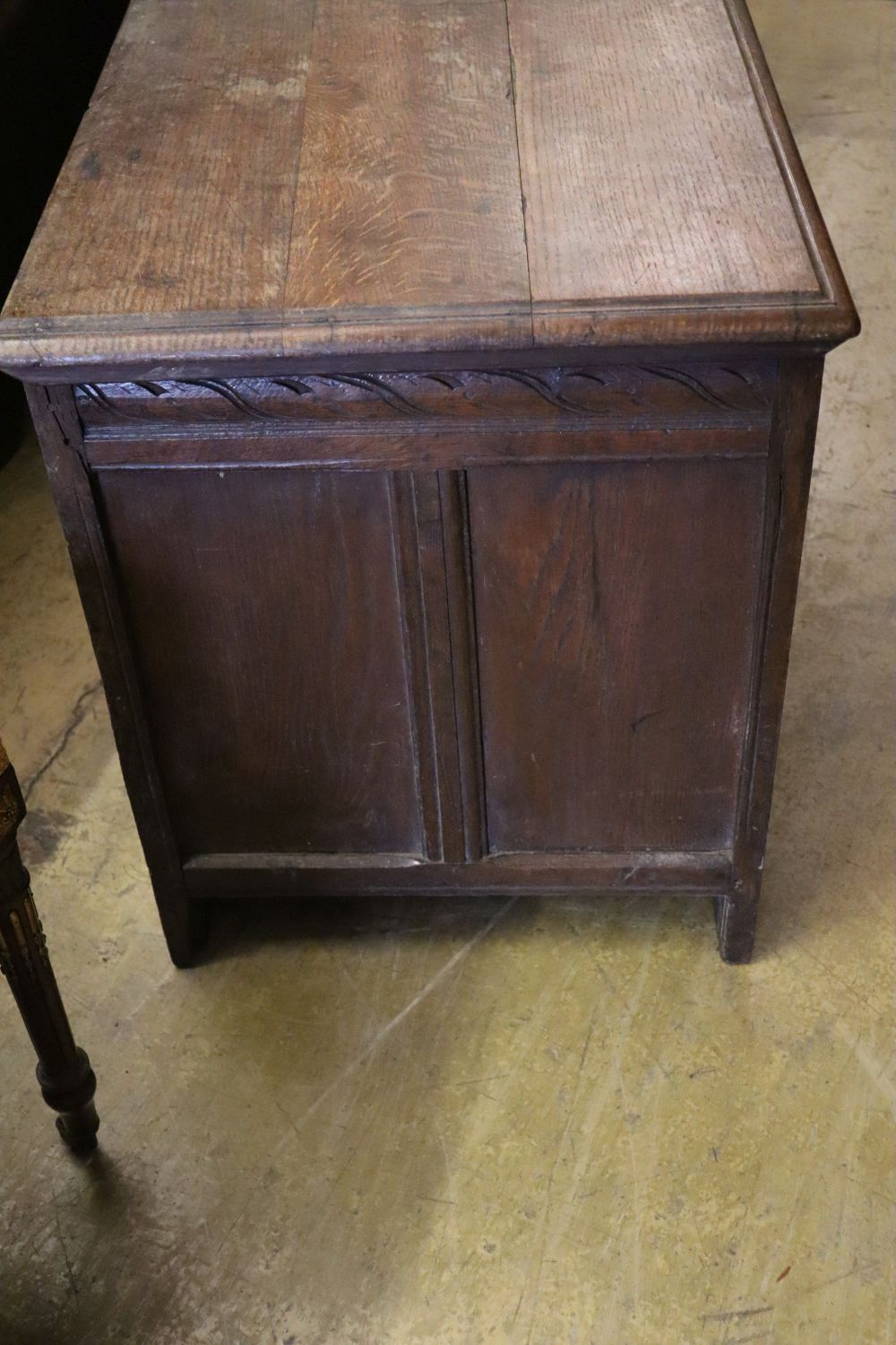 A 17th/18th century inlaid oak coffer with panelled front and planked top, width 145cm depth 53cm - Image 2 of 4