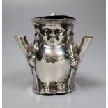 An Edwardian novelty silver mounted inkwell modelled as a Toby jug, London 1907, 68mm, weighted.