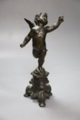 After the Antique. A bronze cherub, height 31cm