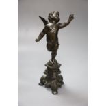 After the Antique. A bronze cherub, height 31cm