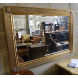 A rectangular gilt frame wall mirror, 110 x 79cm