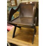 A Victorian oak Glastonbury armchair