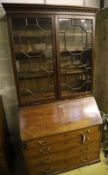 A George III mahogany bureau bookcase, width 107cm, depth 60cm, height 214cm