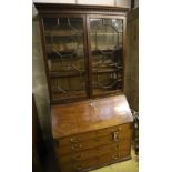 A George III mahogany bureau bookcase, width 107cm, depth 60cm, height 214cm