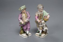 A pair of Meissen porcelain figures, height 10cm (damaged)