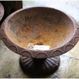 A pair of Victorian cast iron campana urns, 33cm diameter