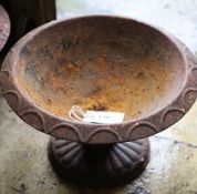 A pair of Victorian cast iron campana urns, 33cm diameter