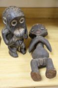 Two Mabila wood figures, one with 'peg' hair, tallest 49cm