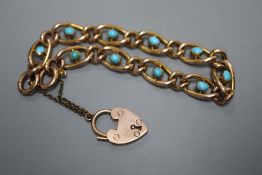 An Edwardian 9ct oval link bracelet, set with ten cabochon turquoise stones, approx. 18cm, gross 9.7