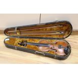 A cased violin with two bows. Violin bears the label Carl Willhelm Claesel, circa late 18th