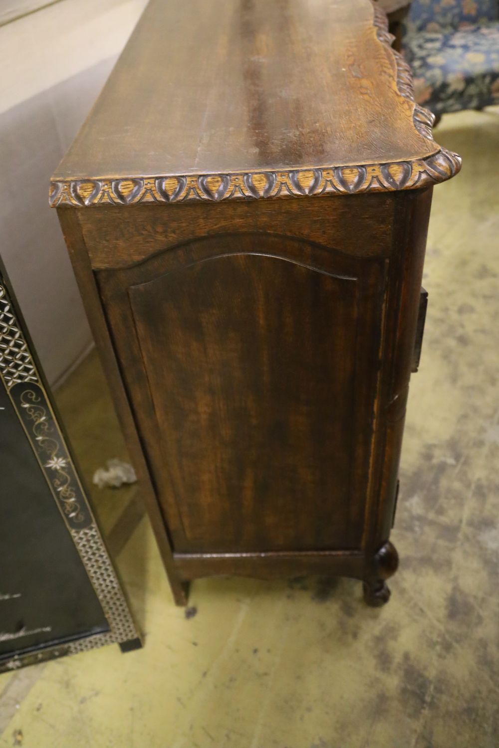 A 20th century French oak commode, fitted four long drawers with carved decoration, width 122cm, - Image 3 of 4