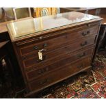 An inlaid mahogany chest fitted four graduated long drawers and brushing slide, width 92cm, depth