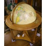 A modern terrestrial globe on wooden stand, height 82cm