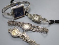 Three lady's assorted silver cocktail wrist watches and a sterling watch.
