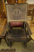 Two carved walnut Italian Renaissance style open armchairs, one with gilt terminals, the back and