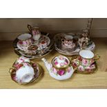 A Royal Albert Old Country Rose part tea set and a Crown Derby coffee set, two Derby comports etc.