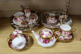 A Royal Albert Old Country Rose part tea set and a Crown Derby coffee set, two Derby comports etc.