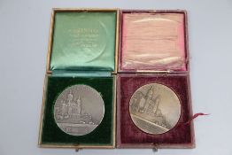 A 1920's silver ladies golfing medal and another similar bronze medal, both boxed