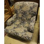 A Howard style upholstered armchair, width 90cm, depth 108cm, height 86cm