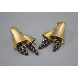 A pair of yellow metal (tests as 18ct) earrings of bell form set with sapphires, 24mm, gross 9.1