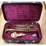 A Boosey & Hawkes Regent brass trumpet, cased