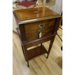 A mahogany cased canteen of cutlery and stand