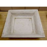 A square marble dish, 51cm sq.