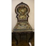A Victorian mahogany hall seat with tapestry upholstery