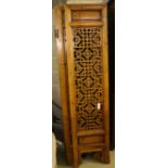 A Chinese carved and pierced pine four-fold screen, each panel width 47cm, height 198cm