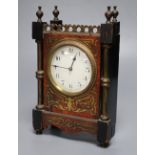 A small 19th century French timepiece, of rectangular form with ebonised and boulle work case and