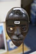 A Dan tribal mask on stand: "Racing Mask'