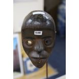 A Dan tribal mask on stand: "Racing Mask'