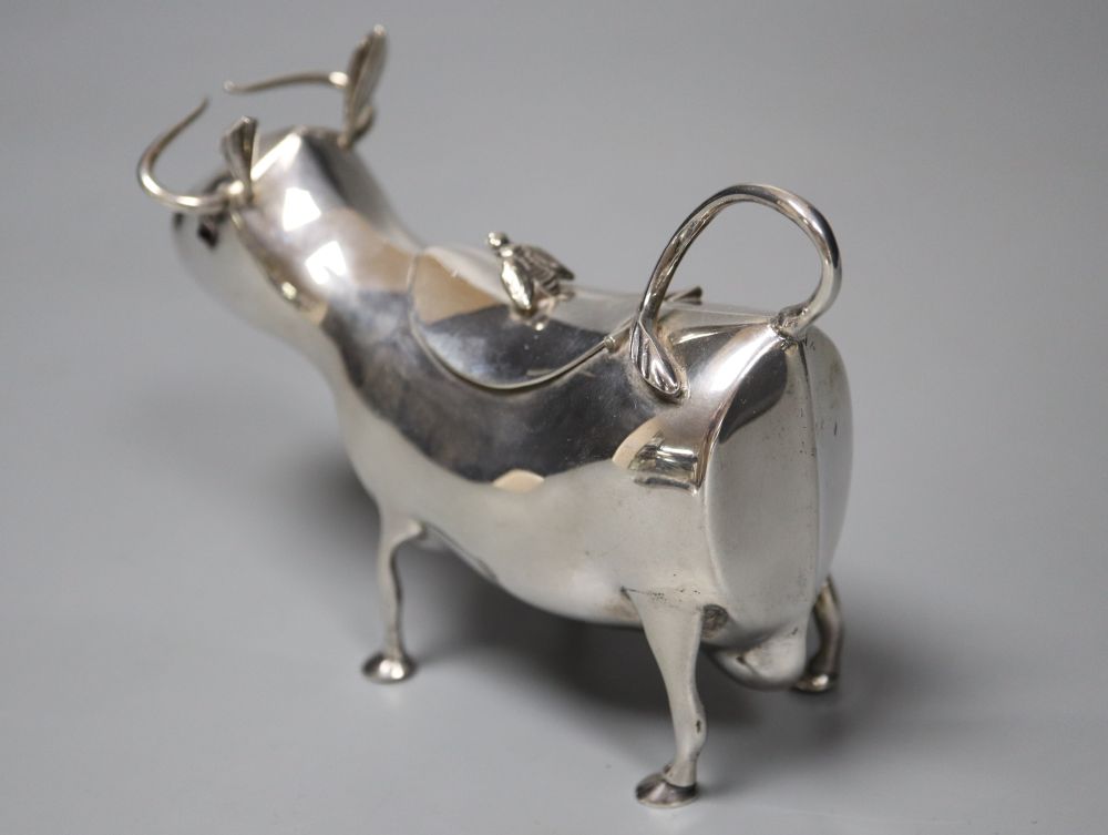 A mid 20th century Dutch white metal cow creamer, length 14cm, gross 145 grams. - Image 3 of 6